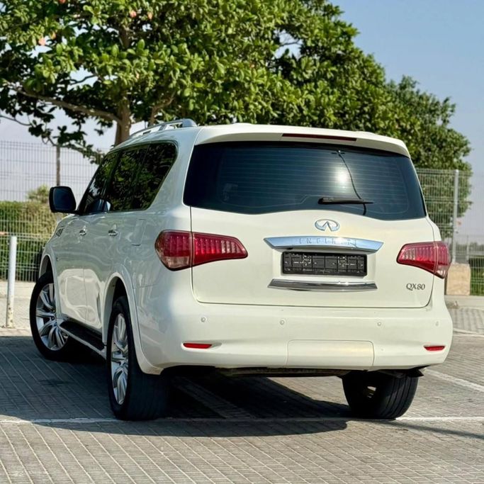 Used Infiniti QX80 I, 5.6 l, 2014 in Sharjah by Sarmad Cars, White color. Other | AUTO.AE