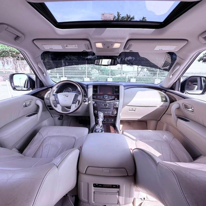 Used Infiniti QX80 I, 5.6 l, 2014 in Sharjah by Sarmad Cars, White color. Other | AUTO.AE