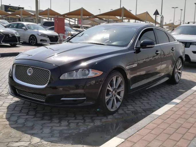 Подержанный Jaguar XJ IV (X351), 3.0 л, 2015 в Шардже от Alfaris Used Cars Черный цвет. Other | AUTO.AE
