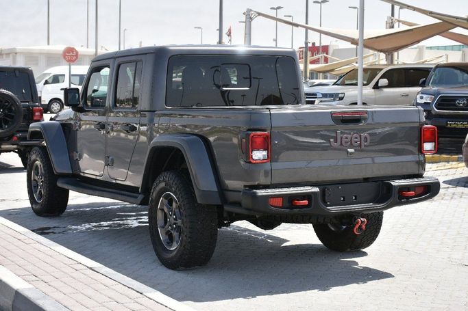 Подержанный Jeep Gladiator II (JT), 3.6 л, 2022 в Шардже от Alfaris Used Cars Серый цвет.  | AUTO.AE