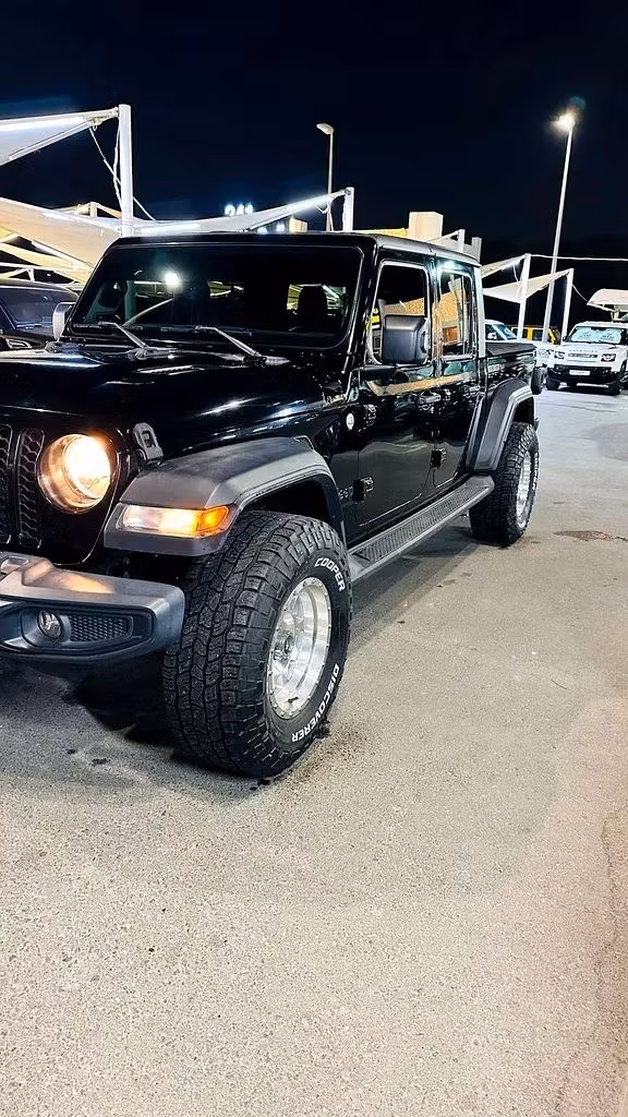 New Jeep Gladiator II (JT), 3.6 l, 2020 in Sharjah by Imad Younis Almani used Cars, Black color. GCC Specs | AUTO.AE