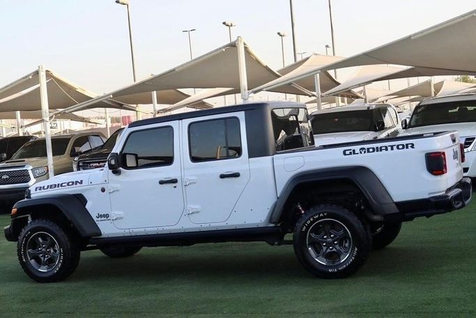 Подержанный Jeep Gladiator II (JT), 3.6 л, 2021 в Шардже от Al Bake Used Cars Белый цвет.  | AUTO.AE