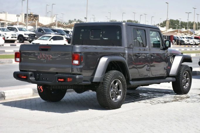 Подержанный Jeep Gladiator II (JT), 3.6 л, 2022 в Шардже от Alfaris Used Cars Серый цвет. Other | AUTO.AE