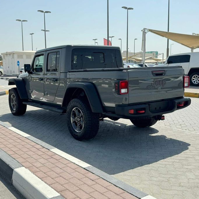 Подержанный Jeep Gladiator II (JT), 3.6 л, 2023 в Шардже от Alfaris Used Cars Серый цвет. Other | AUTO.AE