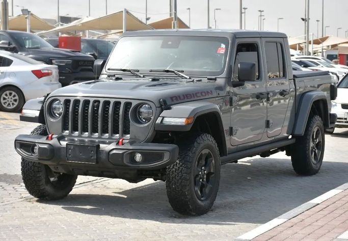 Подержанный Jeep Gladiator II (JT), 3.6 л, 2021 в Шардже от Alfaris Used Cars Серый цвет. Other | AUTO.AE