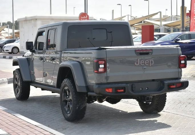 Подержанный Jeep Gladiator II (JT), 3.6 л, 2021 в Шардже от Alfaris Used Cars Серый цвет. Other | AUTO.AE