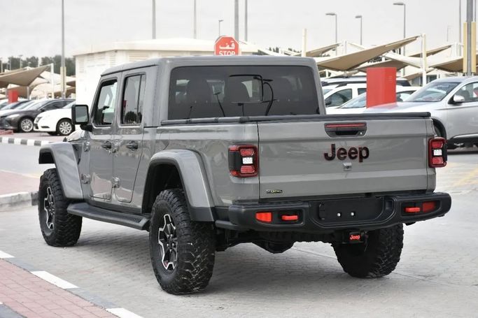 Подержанный Jeep Gladiator II (JT), 3.6 л, 2022 в Шардже от Alfaris Used Cars Серый цвет. Other | AUTO.AE