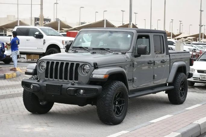 Подержанный Jeep Gladiator II (JT), 3.6 л, 2023 в Шардже от Alfaris Used Cars Серый цвет. Other | AUTO.AE