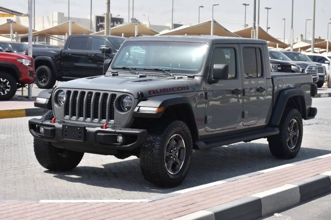 Подержанный Jeep Gladiator II (JT), 3.6 л, 2021 в Шардже от Alfaris Used Cars Серый цвет. Other | AUTO.AE
