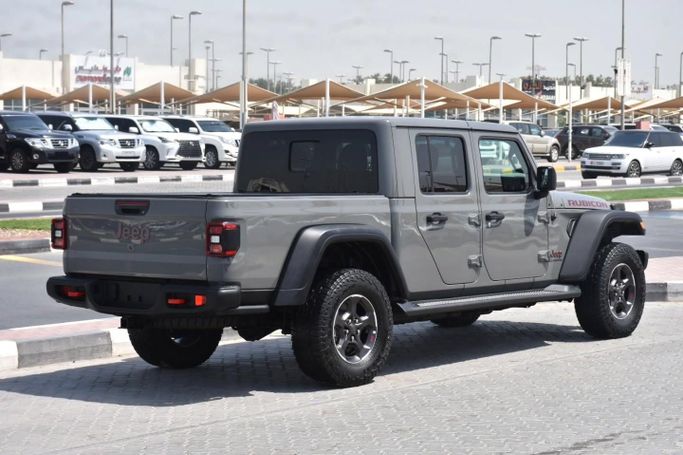 Подержанный Jeep Gladiator II (JT), 3.6 л, 2021 в Шардже от Alfaris Used Cars Серый цвет. Other | AUTO.AE