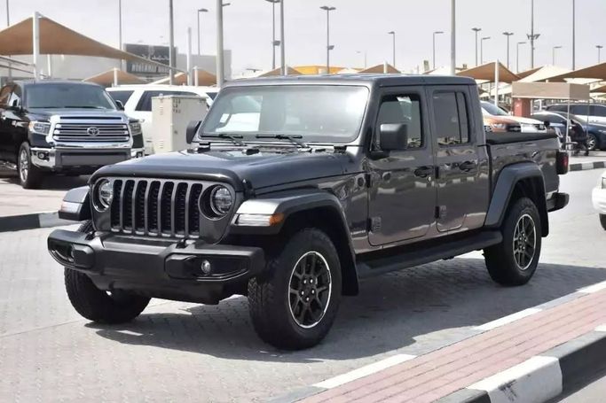 Подержанный Jeep Gladiator II (JT), 3.6 л, 2021 в Шардже от Alfaris Used Cars Серый цвет. Other | AUTO.AE