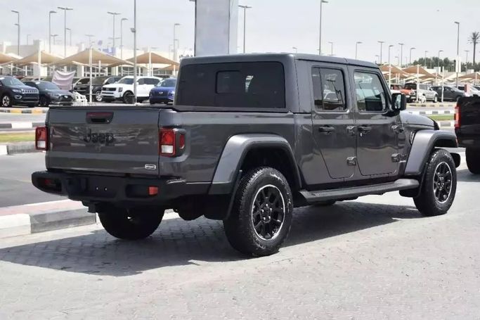 Подержанный Jeep Gladiator II (JT), 3.6 л, 2021 в Шардже от Alfaris Used Cars Серый цвет. Other | AUTO.AE
