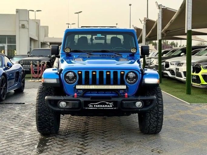Подержанный Jeep Gladiator II (JT), 3.6 л, 2021 в Шардже от Al Fakhamah Used Cars Синий цвет. Американская | AUTO.AE