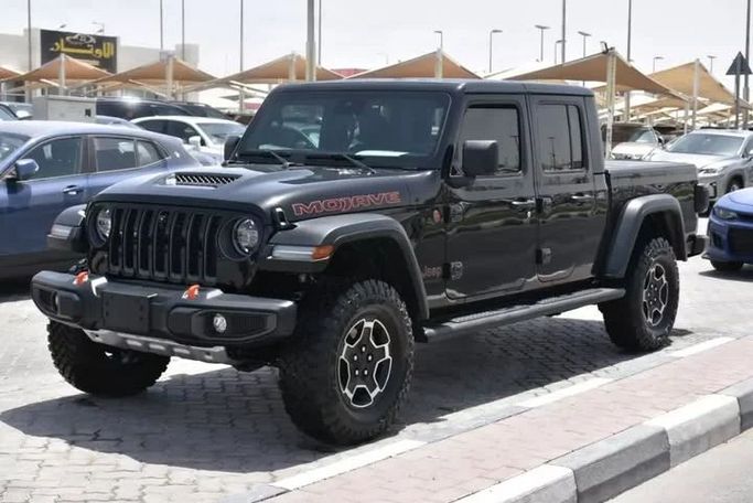 Подержанный Jeep Gladiator II (JT), 3.6 л, 2021 в Шардже от Alfaris Used Cars Черный цвет. Other | AUTO.AE