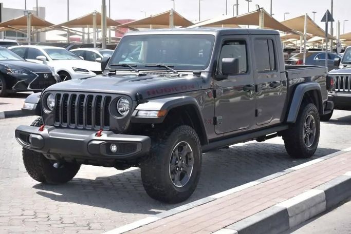 Подержанный Jeep Gladiator II (JT), 3.6 л, 2022 в Шардже от Alfaris Used Cars Серый цвет. Other | AUTO.AE