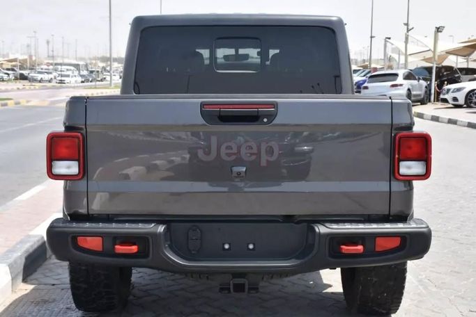 Подержанный Jeep Gladiator II (JT), 3.6 л, 2022 в Шардже от Alfaris Used Cars Серый цвет. Other | AUTO.AE