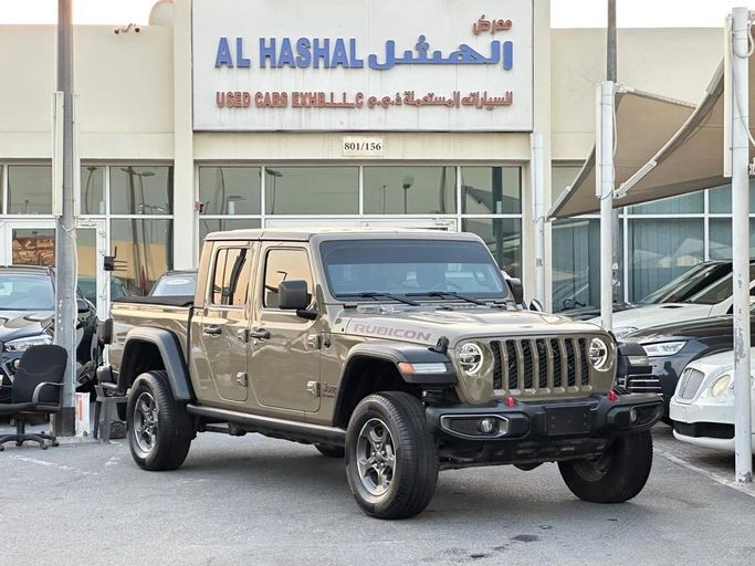 Подержанный Jeep Gladiator II (JT), 3.6 л, 2020 в Шардже от Al Hashal Used Cars Золотистый цвет. Канадская | AUTO.AE