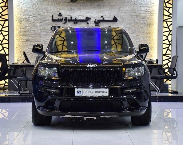 Used Jeep Grand Cherokee IV (WK2), 5.7 l, 2012 in Sharjah by Honey Gidosha Used Cars Tr., Black color.  | AUTO.AE