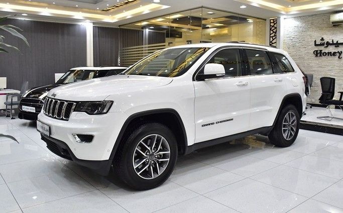 Used Jeep Grand Cherokee IV (WK2) Facelift, 3.6 l, 2020 in Sharjah by Honey Gidosha Used Cars Tr., White color.  | AUTO.AE