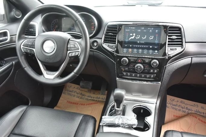 Used Jeep Grand Cherokee V (WL), 3.6 l, 2021 in Sharjah by Alfaris Used Cars, White color. Other | AUTO.AE