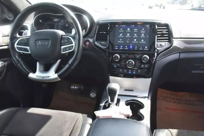 Подержанный Jeep Grand Cherokee IV (WK2) Рестайлинг, 5.7 л, 2020 в Шардже от Alfaris Used Cars Черный цвет. Other | AUTO.AE