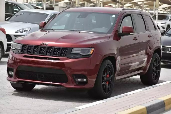 Used Jeep Grand Cherokee SRT IV (WK2) Facelift, 6.4 l, 2021 in Sharjah by Alfaris Used Cars, Red color. Other | AUTO.AE