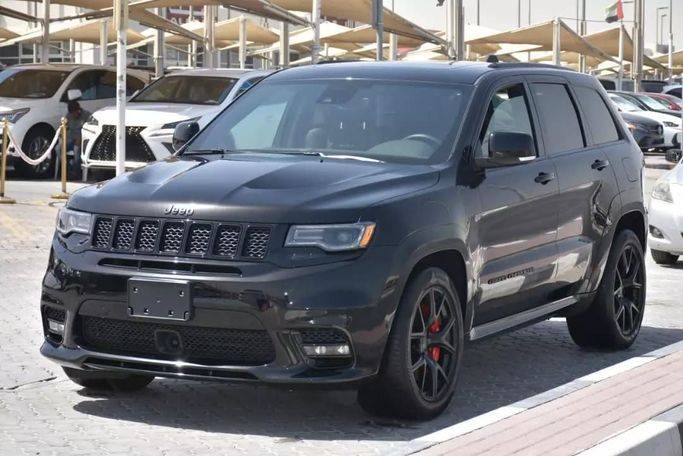 Used Jeep Grand Cherokee SRT IV (WK2) Facelift, 6.4 l, 2021 in Sharjah by Alfaris Used Cars, Black color. Other | AUTO.AE