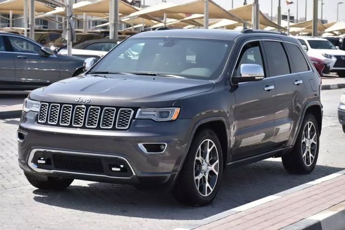Подержанный Jeep Grand Cherokee IV (WK2) Рестайлинг, 3.6 л, 2019 в Шардже от Alfaris Used Cars Серый цвет. Other | AUTO.AE