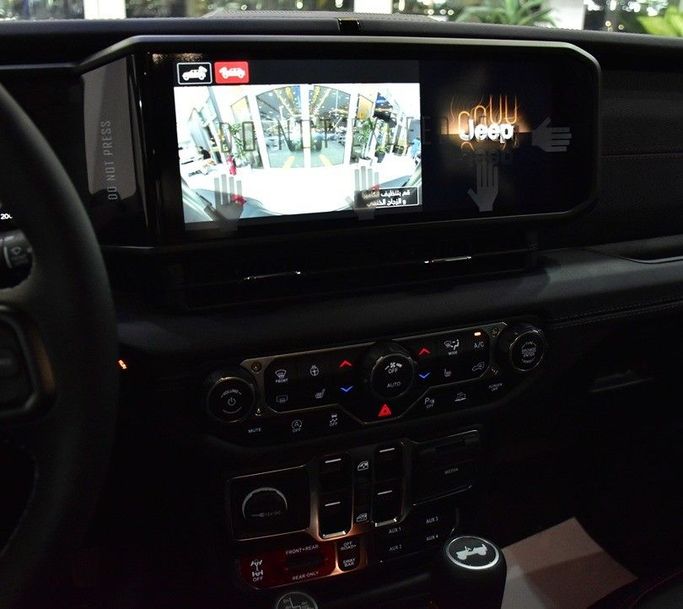 New Jeep Wrangler IV (JL) Facelift, 2.0 l, 2025 in Sharjah by Honey Gidosha Used Cars Tr., Blue color.  | AUTO.AE