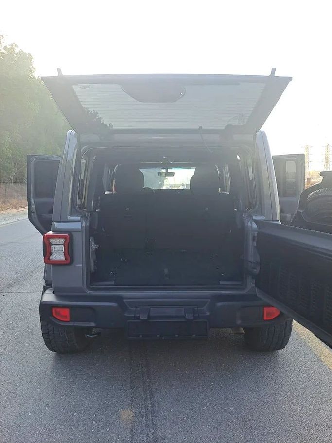Новый Jeep Wrangler IV (JL) Рестайлинг, 3.6 л, 2023 в Шардже от Imad Younis Almani used Cars Серый цвет. GCC | AUTO.AE