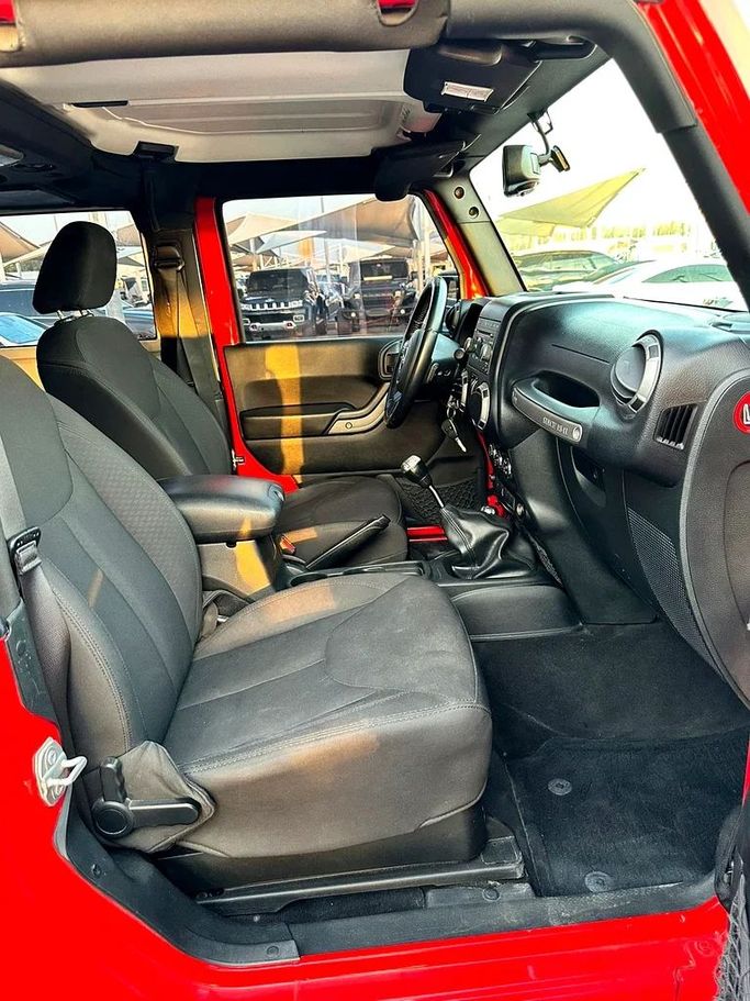 Used Jeep Wrangler IV (JL), 3.6 l, 2017 in Sharjah by Imad Younis Almani used Cars, Red color. GCC Specs | AUTO.AE
