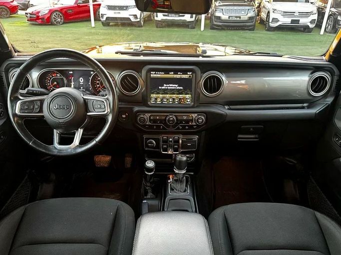 Подержанный Jeep Wrangler IV (JL), 3.6 л, 2021 в Шардже от Ahmad alkhodari Motors Черный цвет. Европейская | AUTO.AE