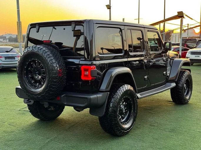 Подержанный Jeep Wrangler IV (JL), 3.6 л, 2021 в Шардже от Ahmad alkhodari Motors Черный цвет. Европейская | AUTO.AE