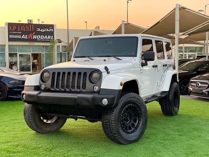 Подержанный Jeep Wrangler III (JK), 3.6 л, 2014 в Шардже от Ahmad alkhodari Motors Белый цвет. GCC | AUTO.AE