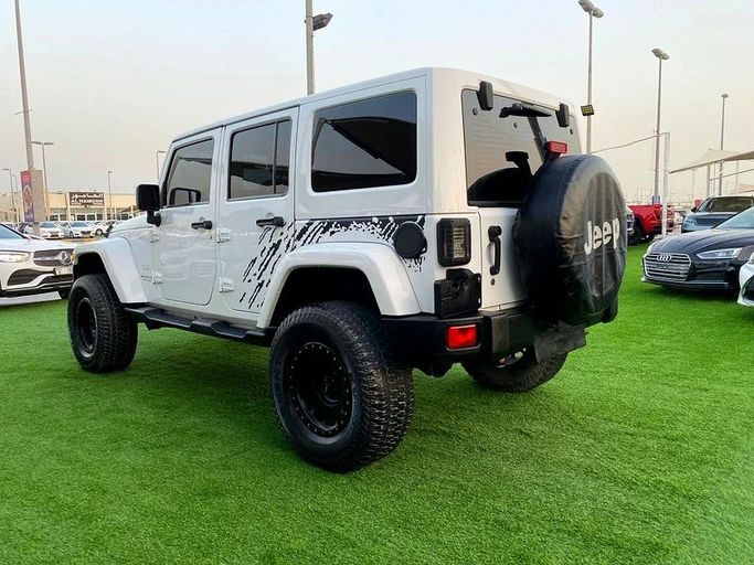 Подержанный Jeep Wrangler III (JK), 3.6 л, 2014 в Шардже от Ahmad alkhodari Motors Белый цвет. GCC | AUTO.AE