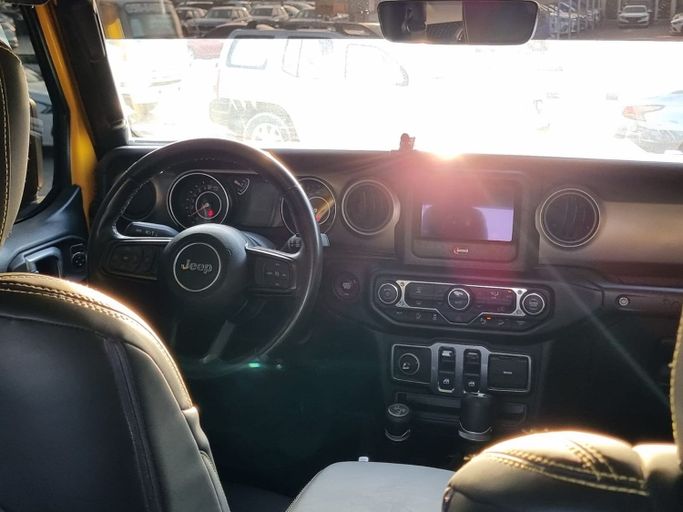 Used Jeep Wrangler IV (JL), 2.0 l, 2018 in Sharjah, Yellow color. GCC Specs | AUTO.AE