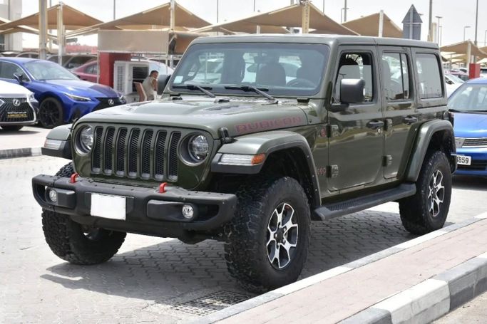 Used Jeep Wrangler IV (JL), 2.0 l, 2022 in Sharjah by Alfaris Used Cars, Green color. Other | AUTO.AE
