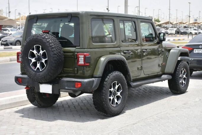 Used Jeep Wrangler IV (JL), 2.0 l, 2022 in Sharjah by Alfaris Used Cars, Green color. Other | AUTO.AE