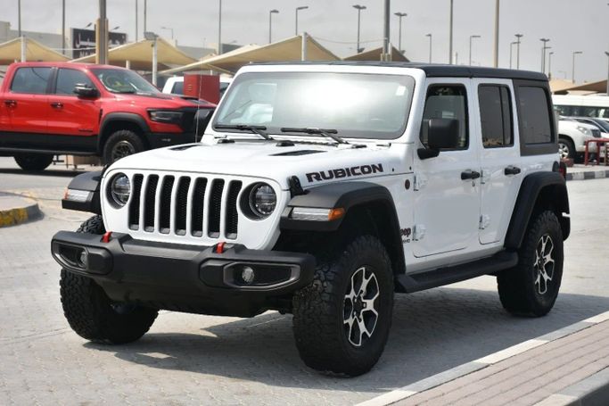 Used Jeep Wrangler IV (JL), 2.0 l, 2022 in Sharjah by Alfaris Used Cars, White color. Other | AUTO.AE
