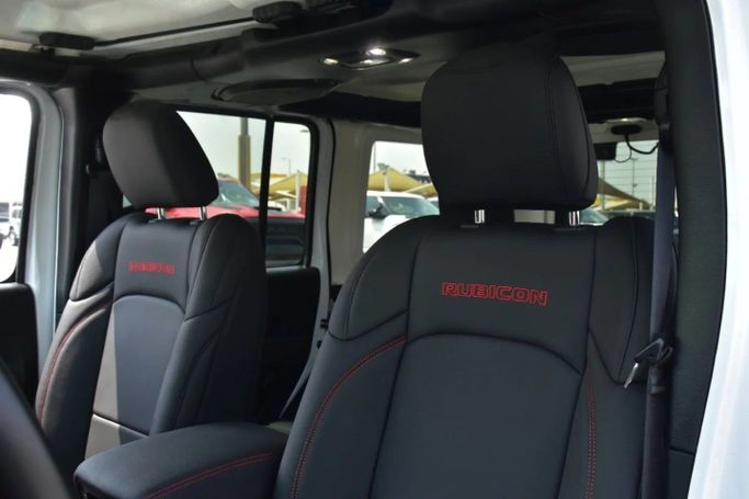 Used Jeep Wrangler IV (JL), 2.0 l, 2022 in Sharjah by Alfaris Used Cars, White color. Other | AUTO.AE