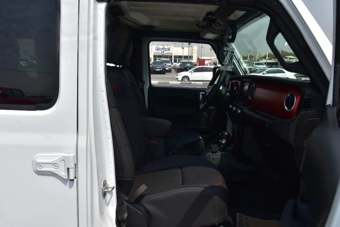 Used Jeep Wrangler IV (JL), 2.0 l, 2022 in Sharjah by Alfaris Used Cars, White color. Other | AUTO.AE