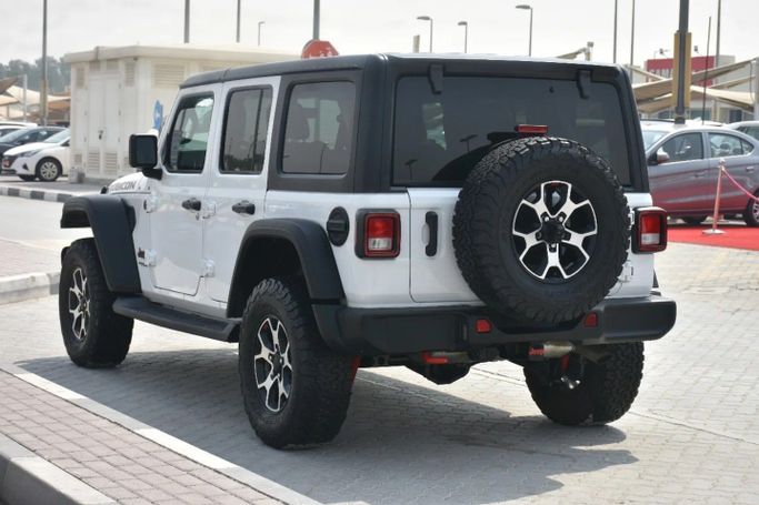 Used Jeep Wrangler IV (JL), 2.0 l, 2022 in Sharjah by Alfaris Used Cars, White color. Other | AUTO.AE
