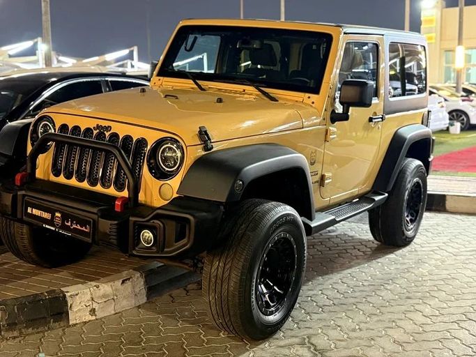 Подержанный Jeep Wrangler III (JK), 3.6 л, 2014 в Шардже от Al Muhtaref Used Cars Желтый цвет. GCC | AUTO.AE