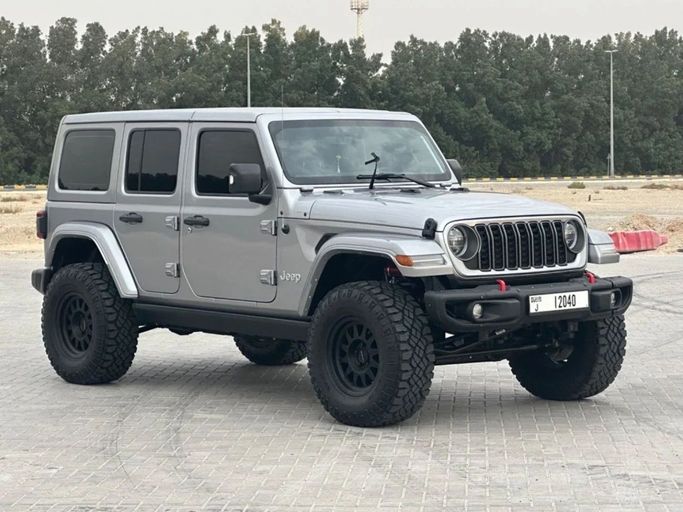 Подержанный Jeep Wrangler IV (JL), 3.6 л, 2021 в Шардже от Al Aayan Used Cars Серый цвет. GCC | AUTO.AE