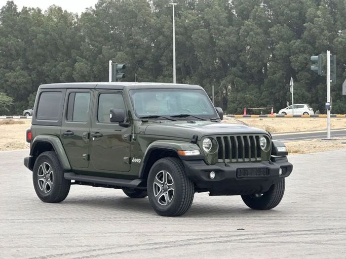 Подержанный Jeep Wrangler IV (JL), 3.6 л, 2021 в Шардже от Al Aayan Used Cars Зеленый цвет. GCC | AUTO.AE