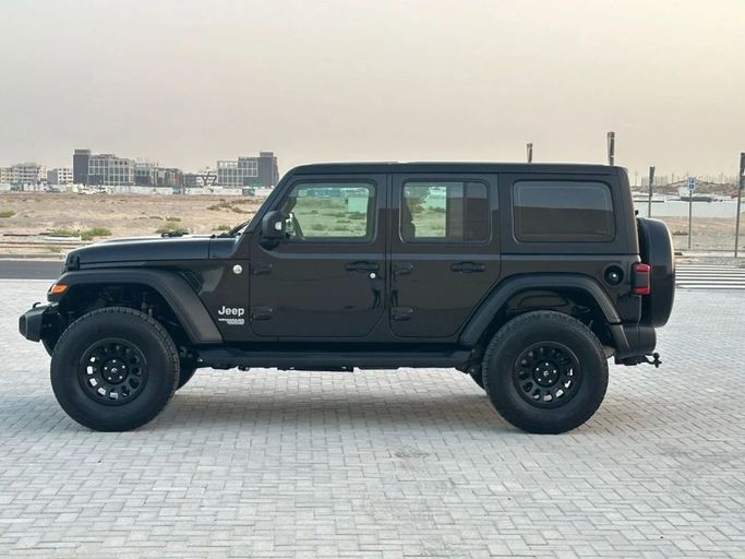 Подержанный Jeep Wrangler IV (JL), 3.6 л, 2020 в Шардже от Al Aayan Used Cars Черный цвет. GCC | AUTO.AE