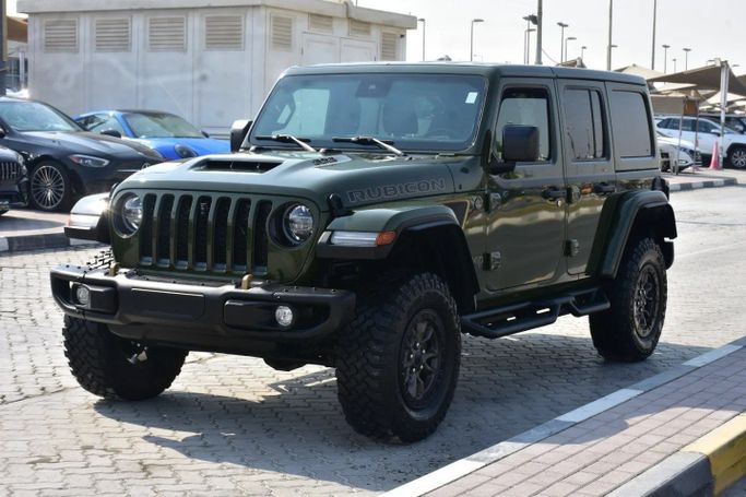 Подержанный Jeep Wrangler IV (JL), 3.6 л, 2021 в Шардже от Alfaris Used Cars Зеленый цвет. Other | AUTO.AE