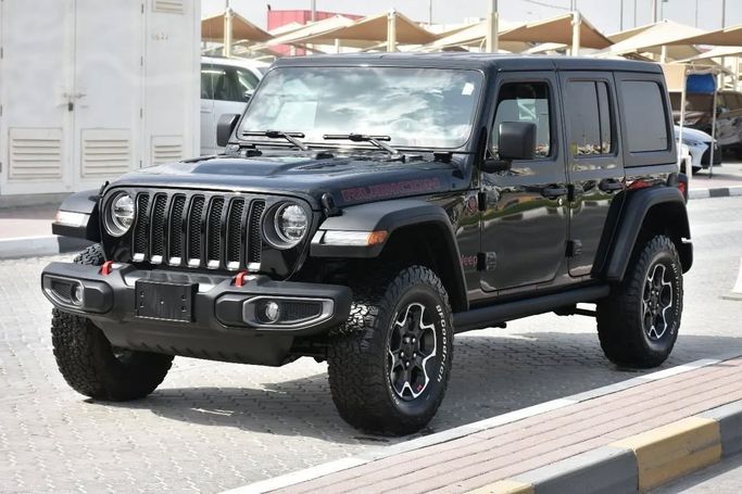 Подержанный Jeep Wrangler IV (JL), 2.0 л, 2023 в Шардже от Alfaris Used Cars Черный цвет. Other | AUTO.AE