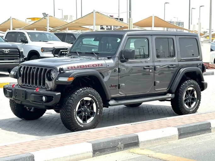 Подержанный Jeep Wrangler IV (JL), 2.0 л, 2022 в Шардже от Alfaris Used Cars Серый цвет. Other | AUTO.AE