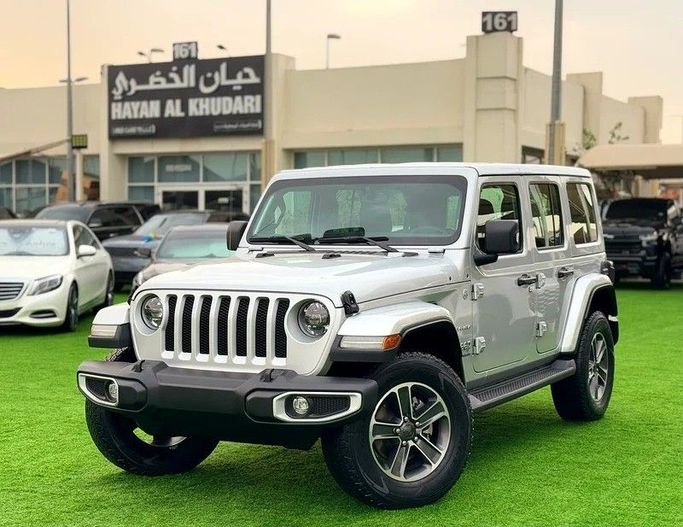 Подержанный Jeep Wrangler IV (JL), 2.0 л, 2023 в Шардже от Hayan Alkhudari Used Cars Белый цвет. GCC | AUTO.AE